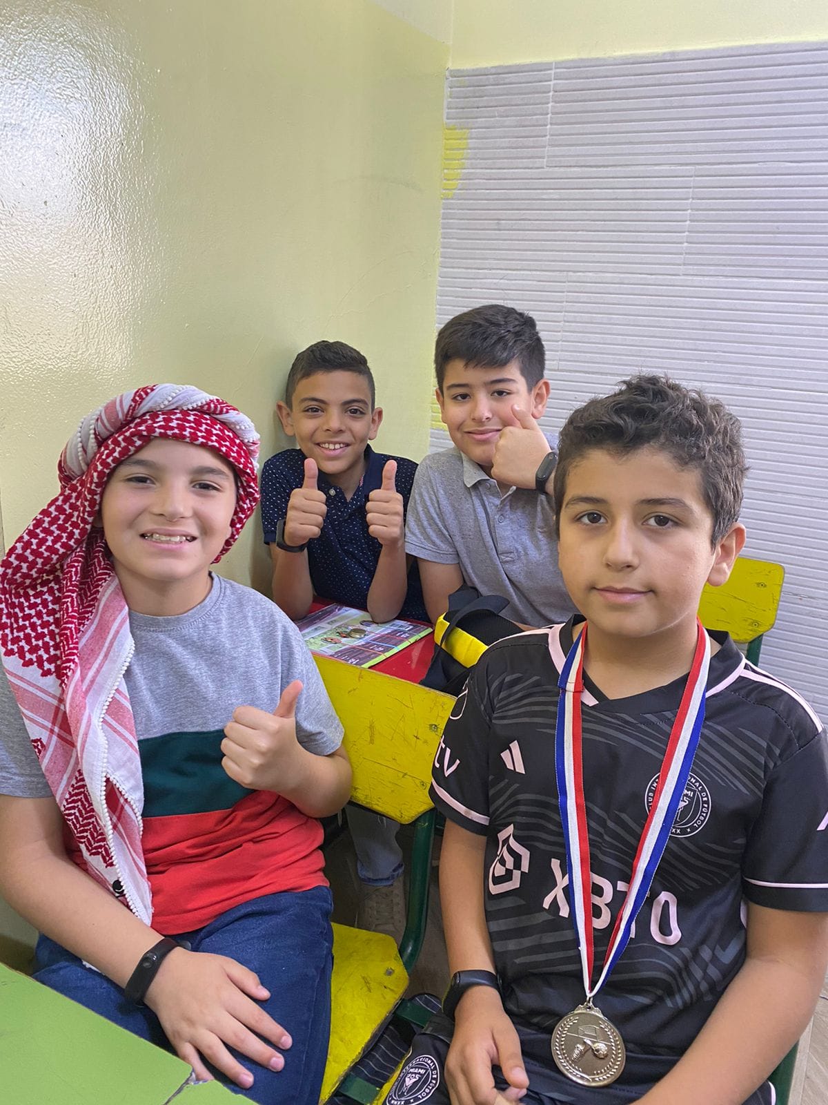 مدرسة الجذور slide 2