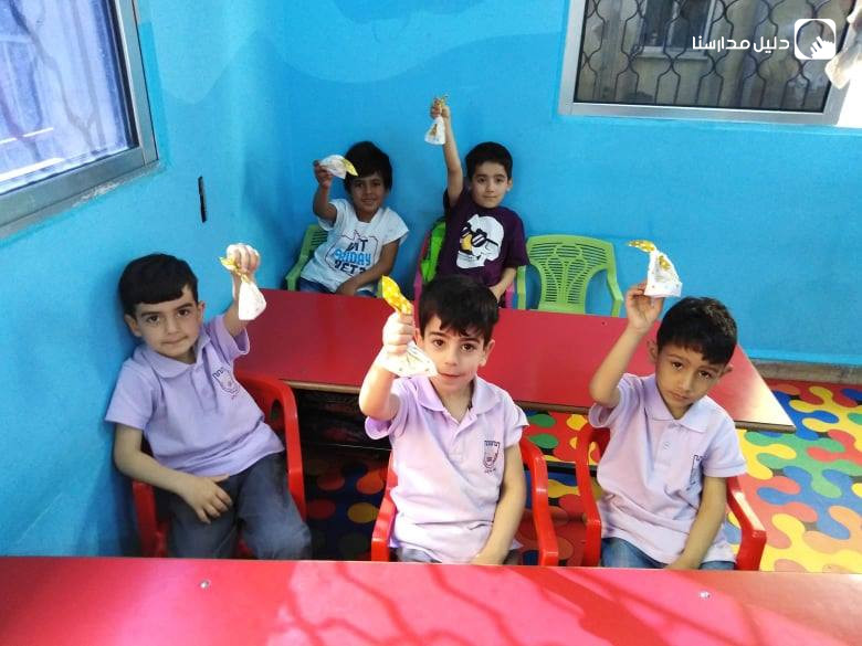 روضة ومدارس نادي السباق slide 2
