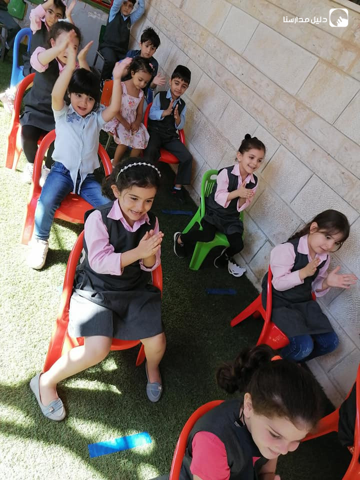 مدرسة رياحين الجنة slide 3