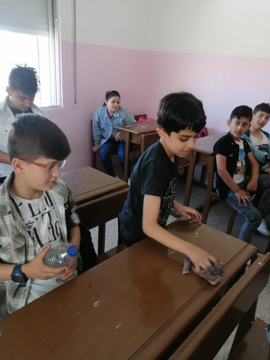 مدرسة رواد الكرك slide 7