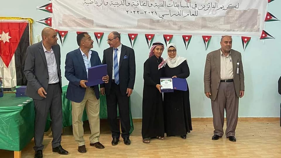 مدرسة رواد الكرك slide 8